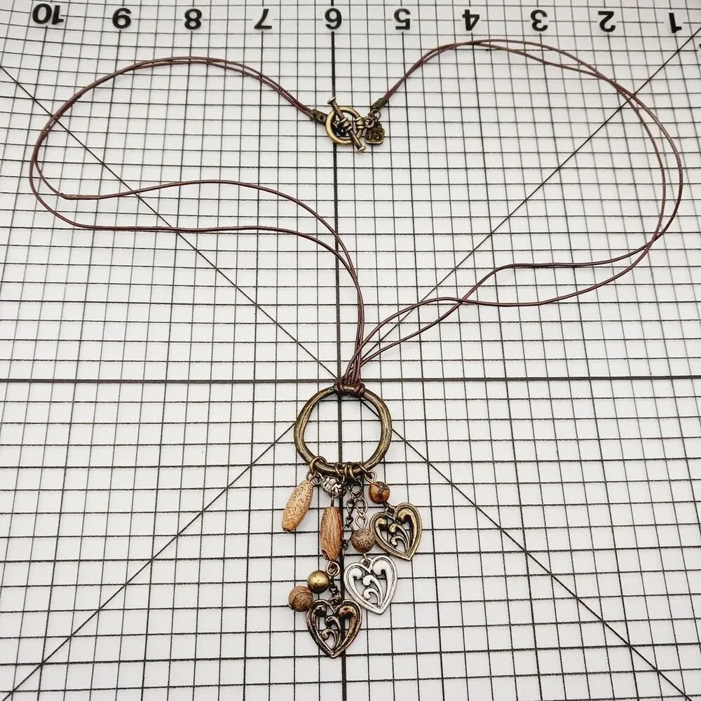 Necklace Jessica Simpson Leatherette Wood Bead Charm Pendant Statement Heart 23